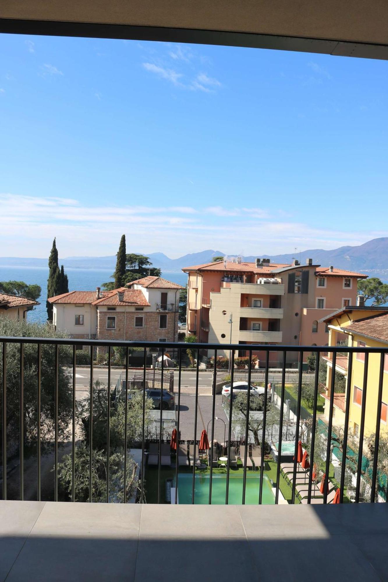 Hotel Ristorante Al Caminetto Worldhotels Crafted Adults Only Торри-дель-Бенако Экстерьер фото